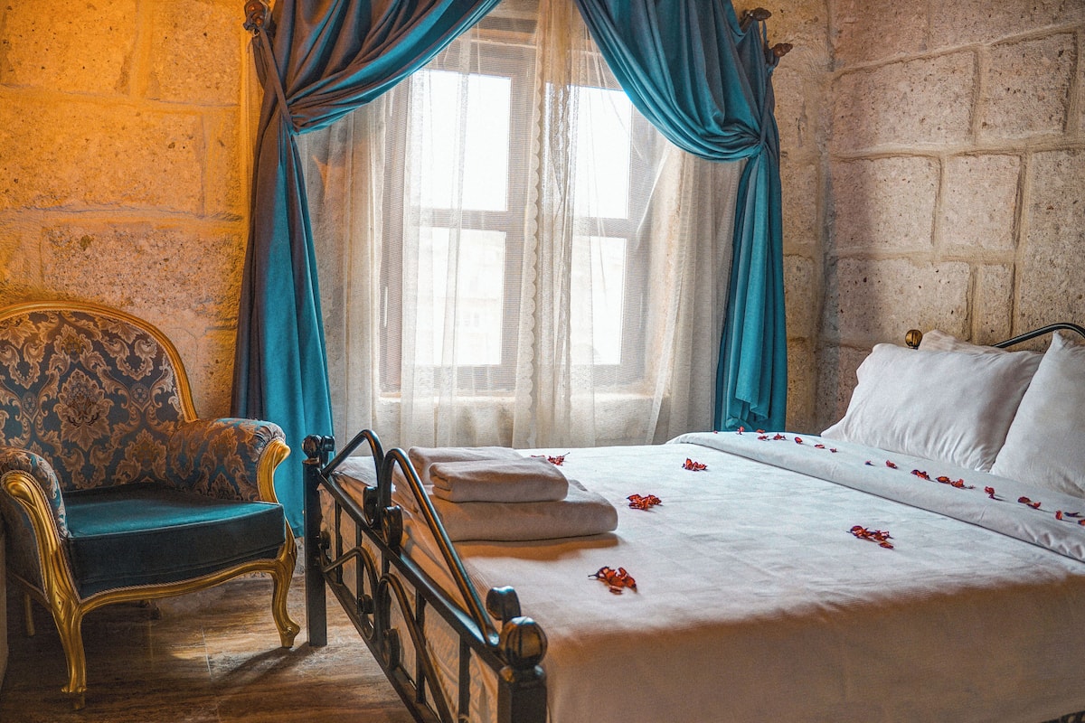 Efe Stone Room | 1 bedroom, premium bedding, down comforters, memory foam beds