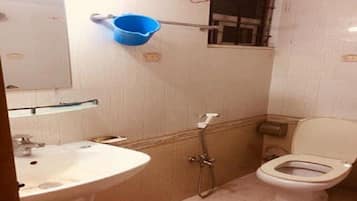 Shower, shampoo, toilet paper