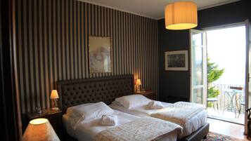 Suite Familiale, 2 chambres, balcon, vue vallée | 2 chambres, chambres insonorisées, draps fournis