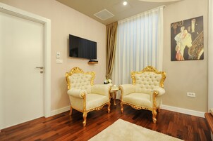 Deluxe Double Room, Balcony | Living area | Flat-screen TV