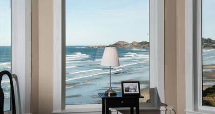 Panoramic Pacific Views at this 2nd floor luxury oceanfront condo, beach access