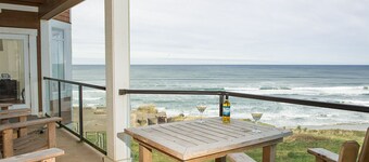 Panoramic Pacific Views at this 2nd floor luxury oceanfront condo, beach access