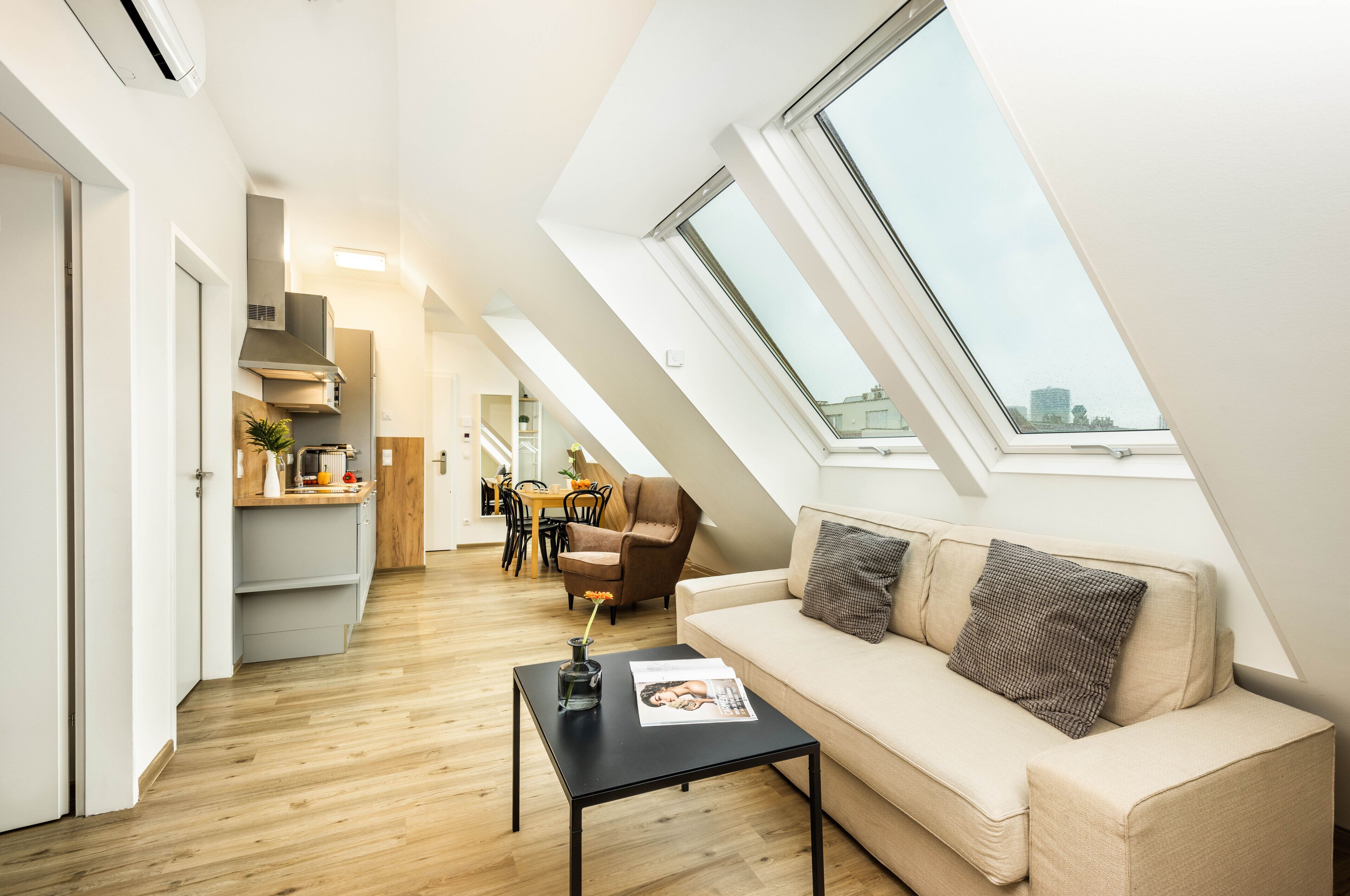 Suite, 2 Bedrooms, Balcony | Living area | Flat-screen TV, heated floors