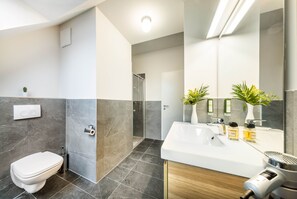 Suite, 2 Bedrooms, Balcony | Bathroom | Shower, toilet paper