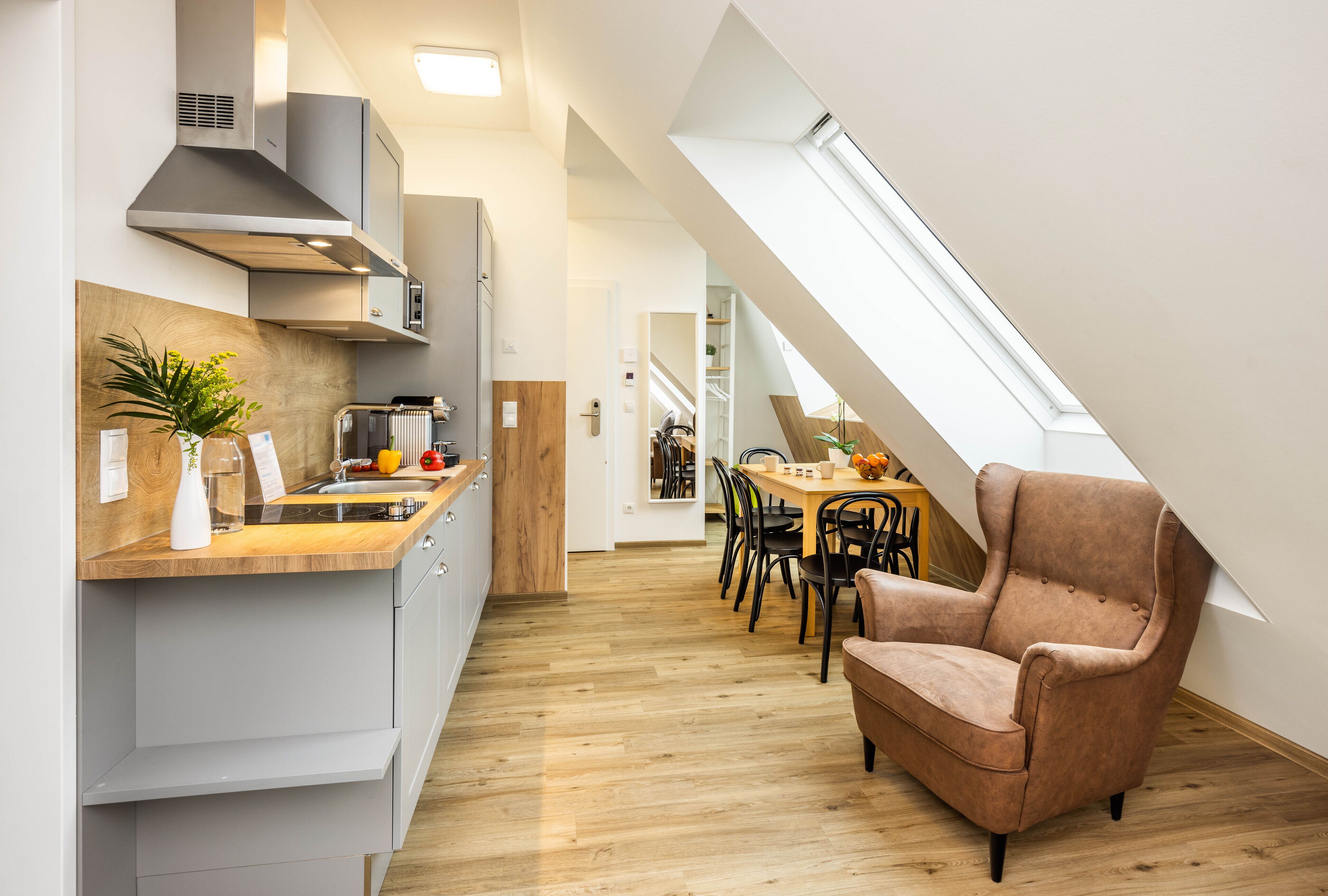 Suite, 2 Bedrooms, Balcony | Living area | Flat-screen TV, heated floors