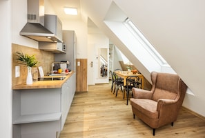 Suite, 2 Bedrooms, Balcony | Living area | Flat-screen TV, heated floors - Jimmy's Apartments Lory (Vienna)