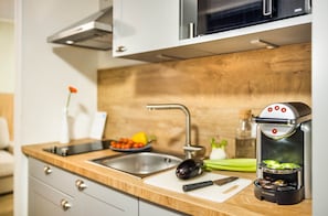 Suite, 1 Bedroom, Balcony (50m2) | Private kitchen | Full-size fridge, microwave, stovetop, dishwasher