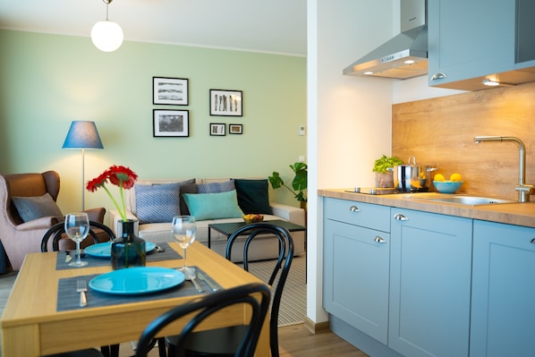Deluxe Apartment, 1 Bedroom, Balcony (36m2) | Living area | Flat-screen TV, heated floors