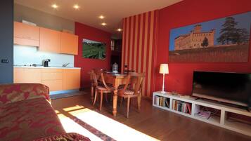 Exclusive Suite, 1 Bedroom, Terrace, Valley View | Living area | Flat-screen TV