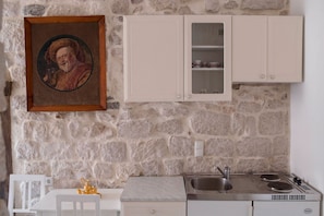 Studio (Markus) | Private kitchenette | Fridge, stovetop, cookware/dishes/utensils - Apartment Four tower (Rab)