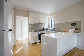 Villa (4 Bedrooms) | Private kitchen | Fridge, microwave, oven, dishwasher
