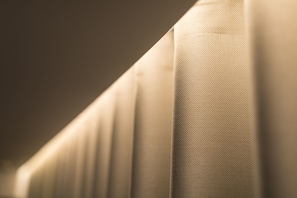 Premium bedding, pillow-top beds, desk, laptop workspace