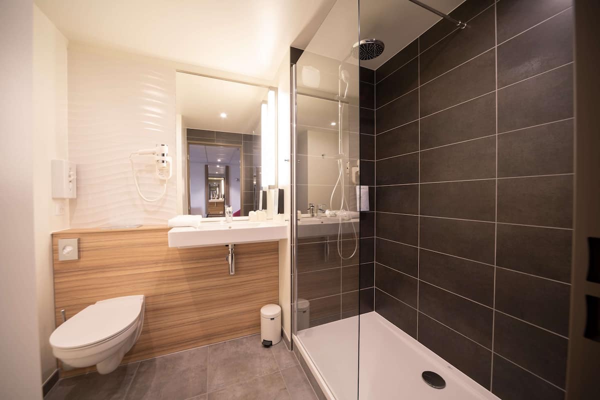 Eco-friendly toiletries, hair dryer, towels, soap