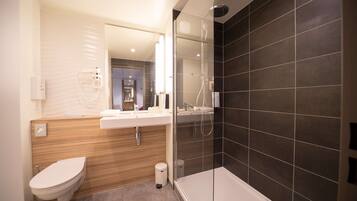 Eco-friendly toiletries, hair dryer, towels, soap
