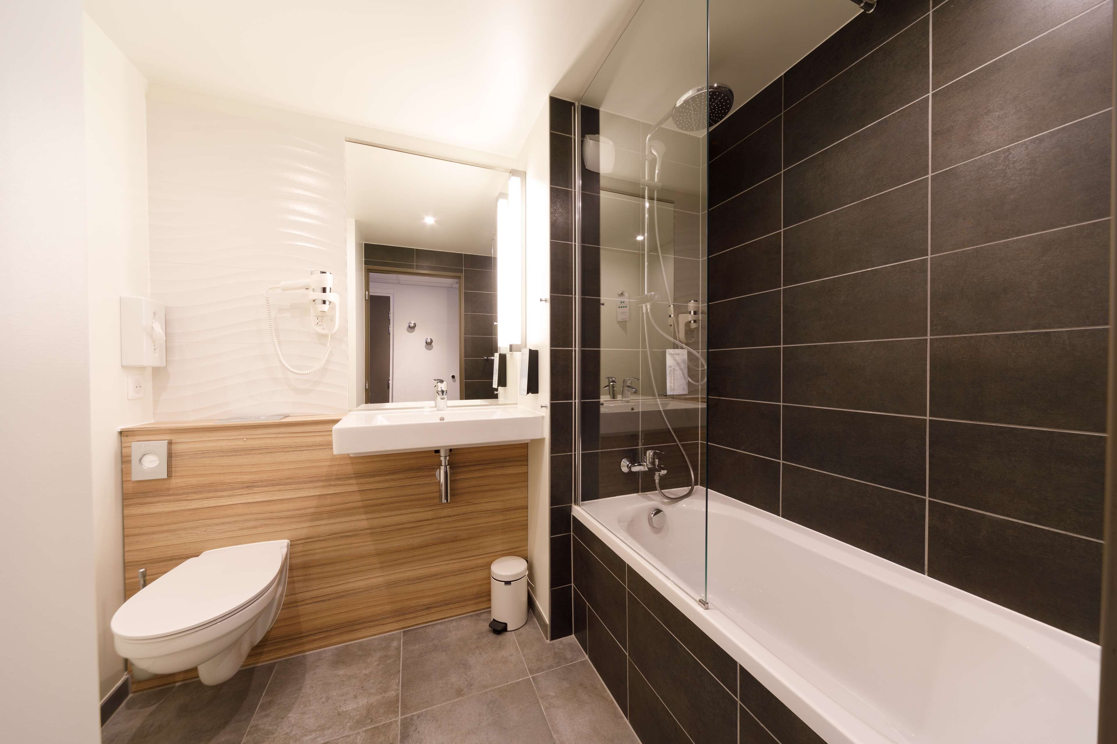 eco-friendly toiletries, hair dryer, towels, soap