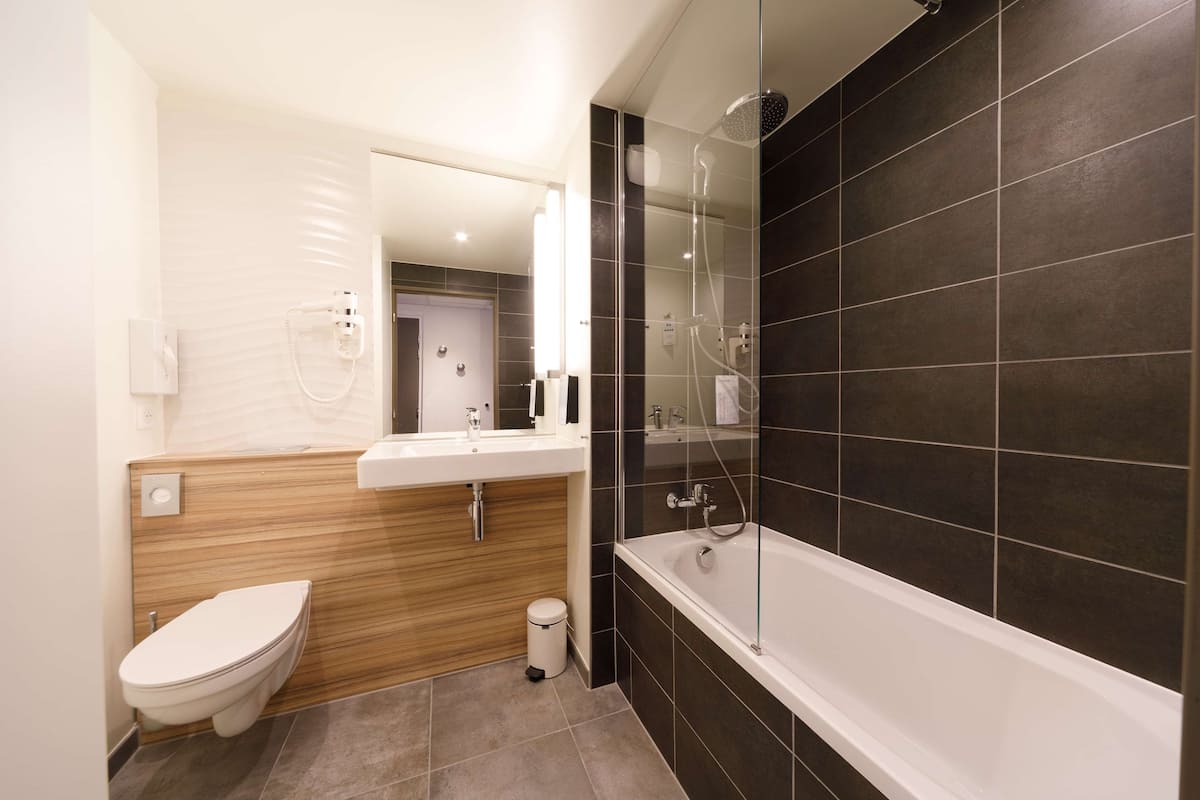 eco-friendly toiletries, hair dryer, towels, soap