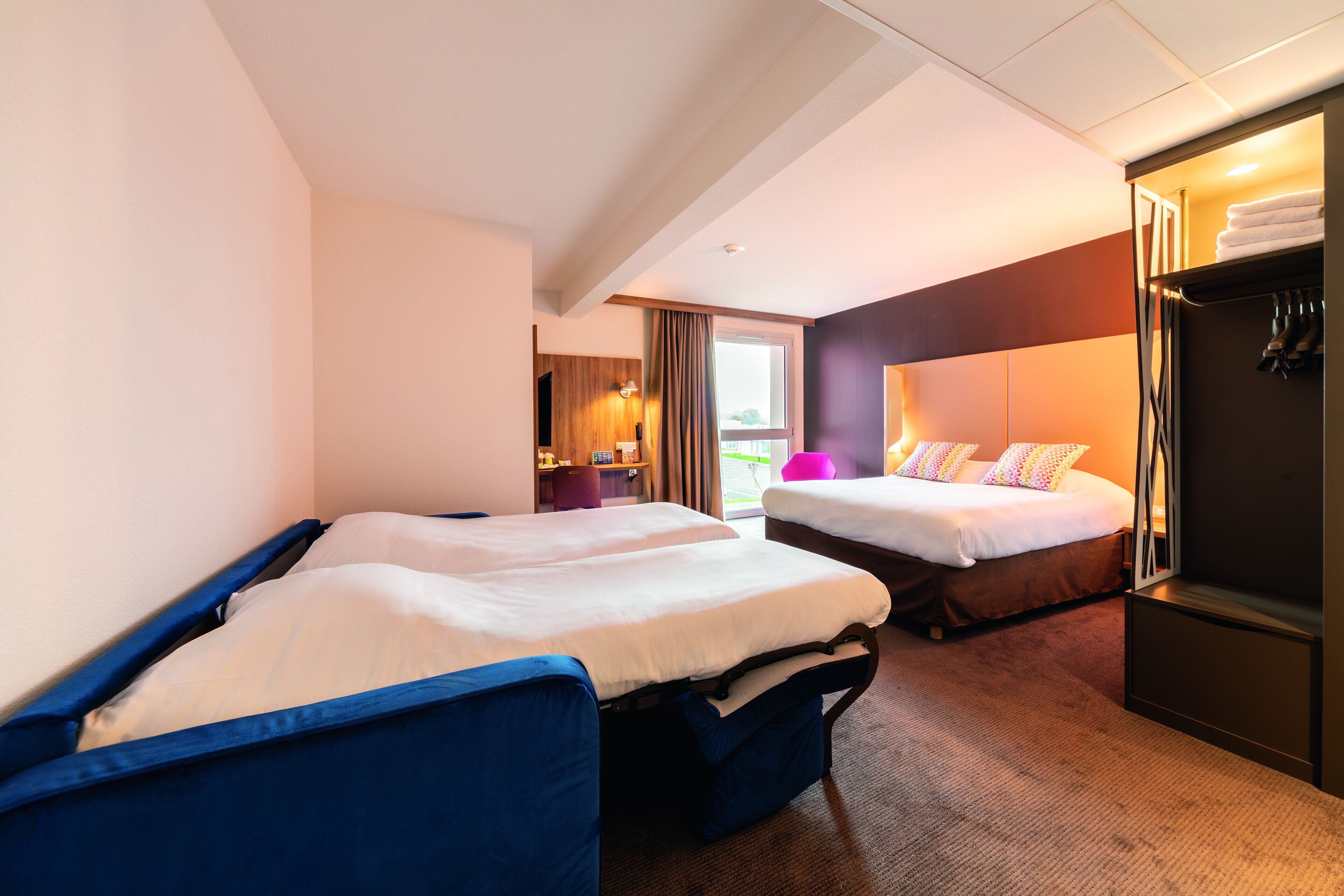 premium bedding, laptop workspace, blackout curtains, soundproofing