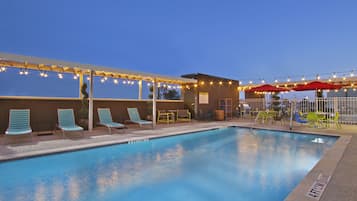 Outdoor pool, pool umbrellas, pool loungers