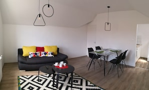 Apartment, 1 Bedroom (Attic) | Living area | LCD TV - Green Garden Plus Apartman (Budapest)