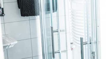 Shower, towels, soap, toilet paper