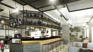 A modern bar area with a high ceiling, metal mesh design, and a counter with stools. - Ibis Wels (Wels)
