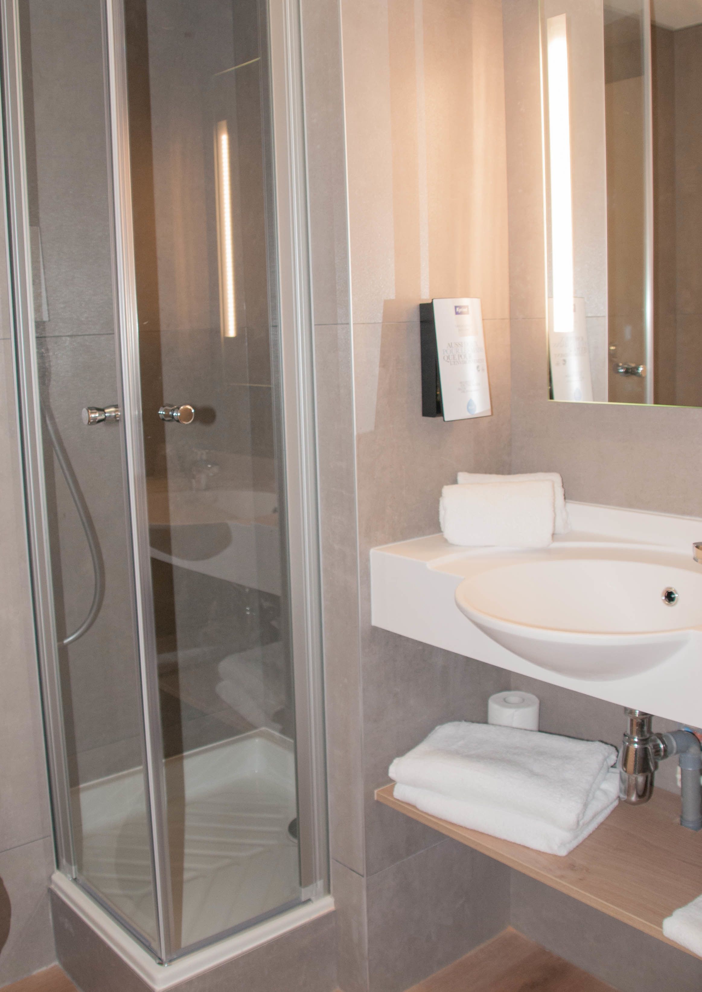 shower, eco-friendly toiletries, hair dryer, towels