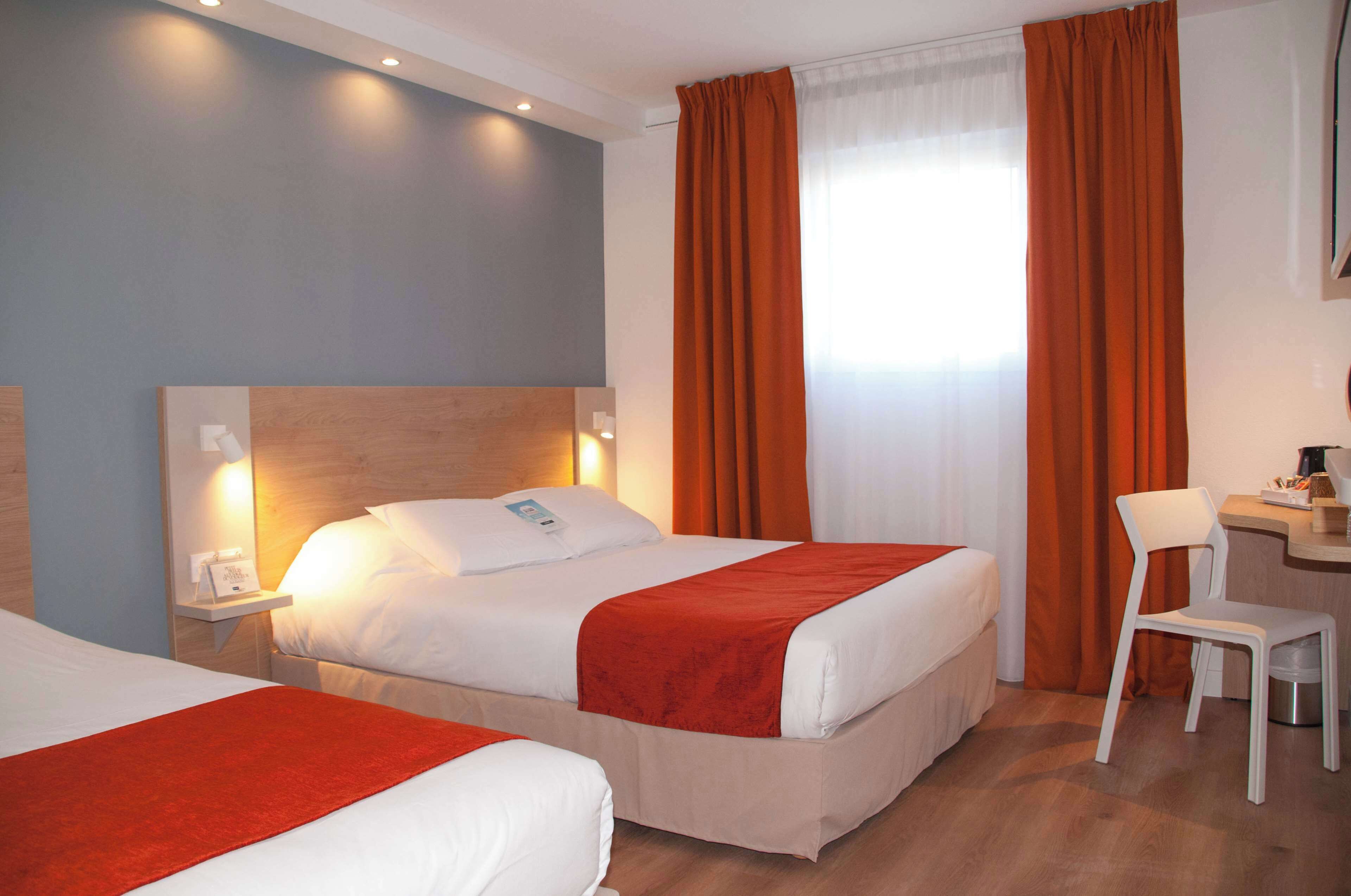 standard room, multiple beds | 1 bedroom, premium bedding, desk, laptop workspace