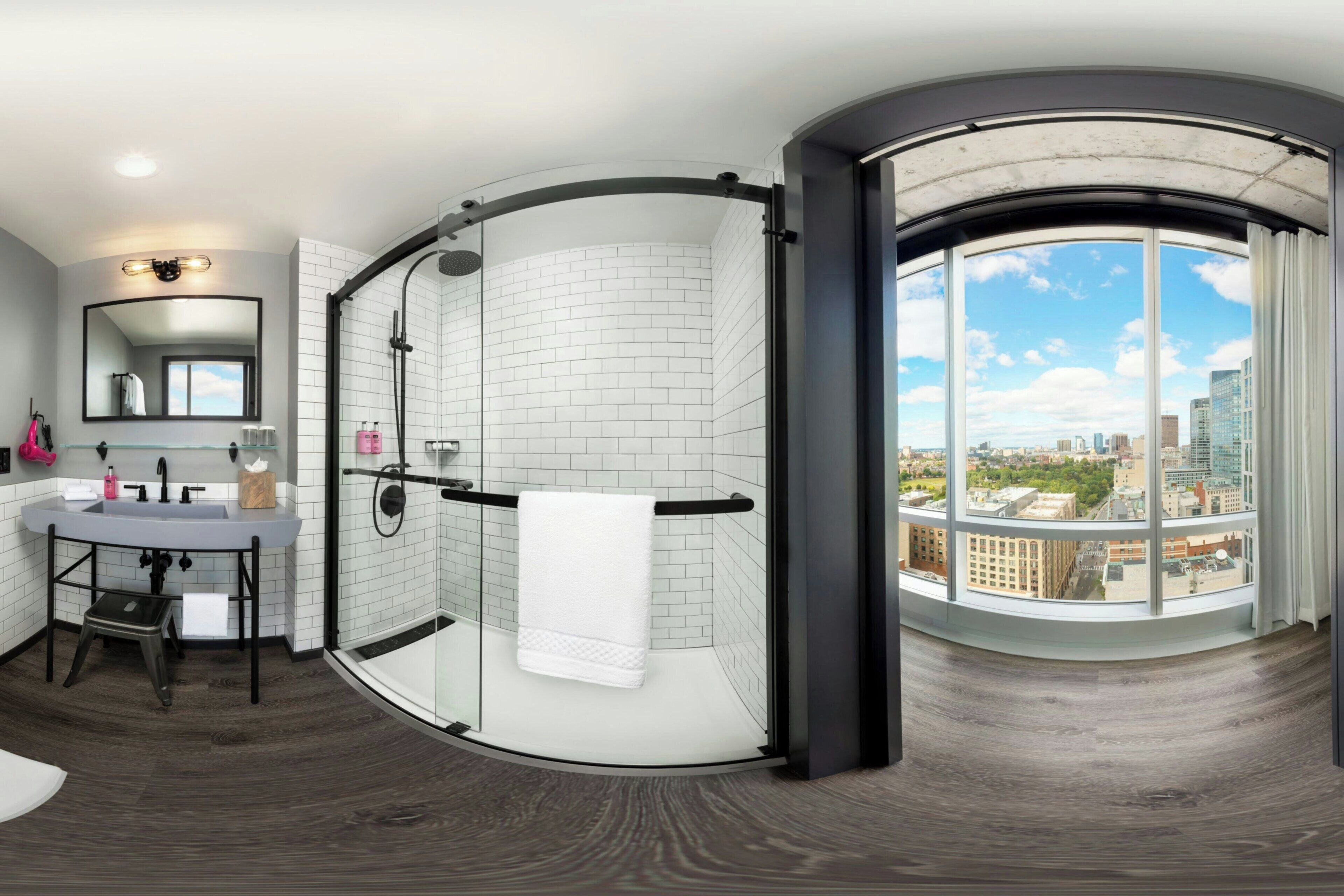 shower, rainfall showerhead, hair dryer, towels