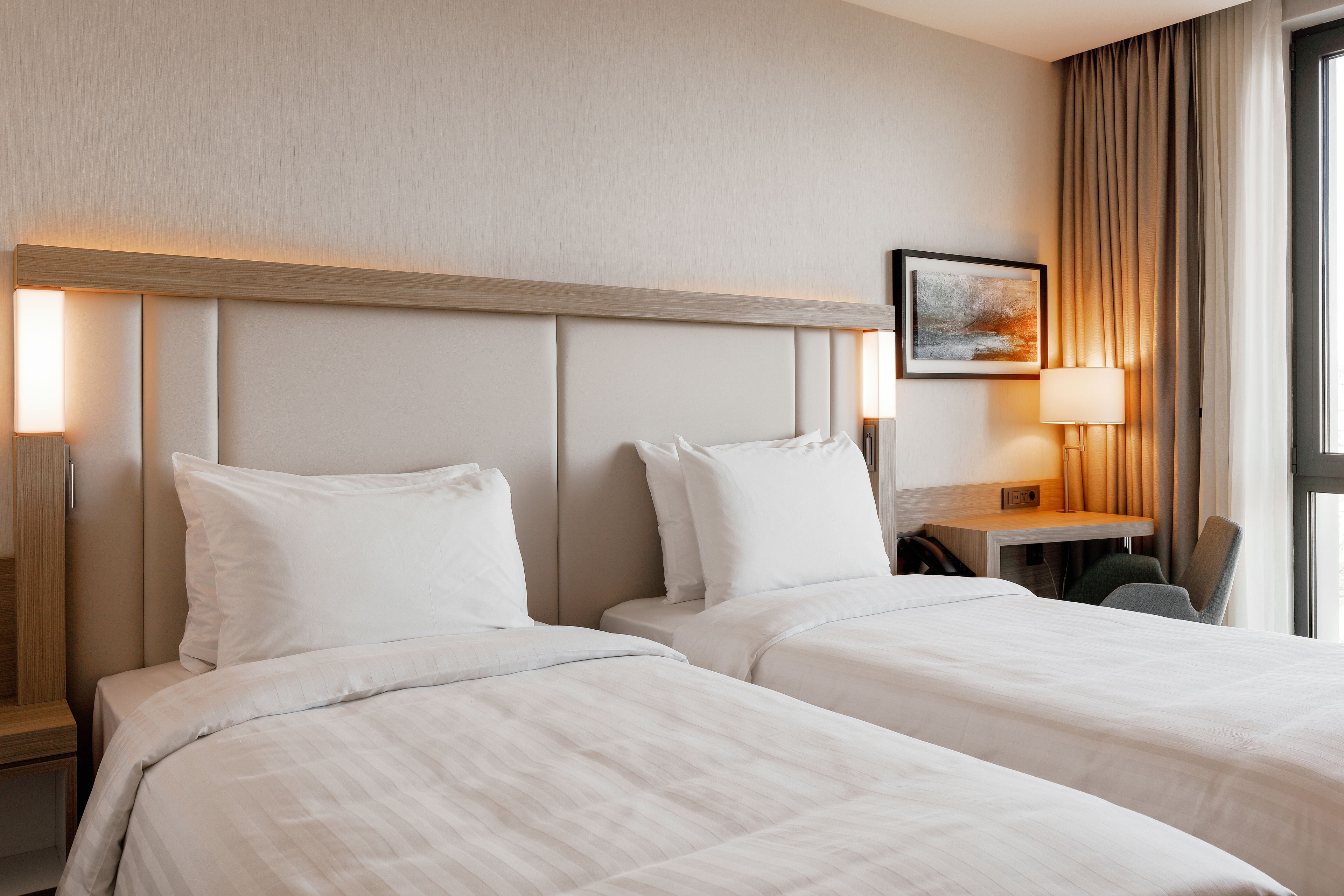 standard room, 2 single beds, city view | in-room safe, individually decorated, individually furnished, desk