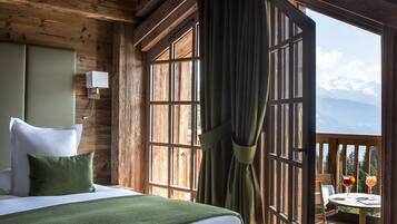 Suite, balcón, vista a la montaña (Orchidee) | 6 habitaciones, ropa de cama de alta calidad y edredón