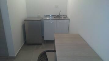 Habitación individual | Escritorio y espacio para trabajar con laptop