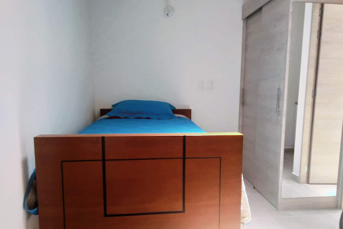 Desk, laptop workspace, iron/ironing board, rollaway beds