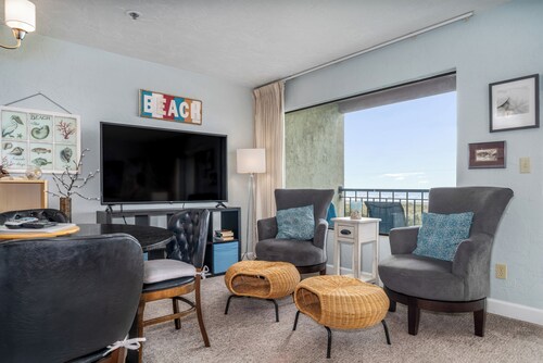 Sweeping oceanfront views from this one bedroom condo right on the prom!