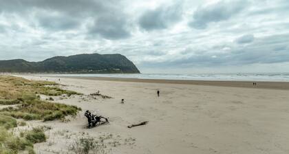 Sweeping oceanfront views from this one bedroom condo right on the prom!