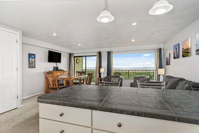 Enjoy the Prom from this beautiful oceanfront condo in the heart of Seaside!