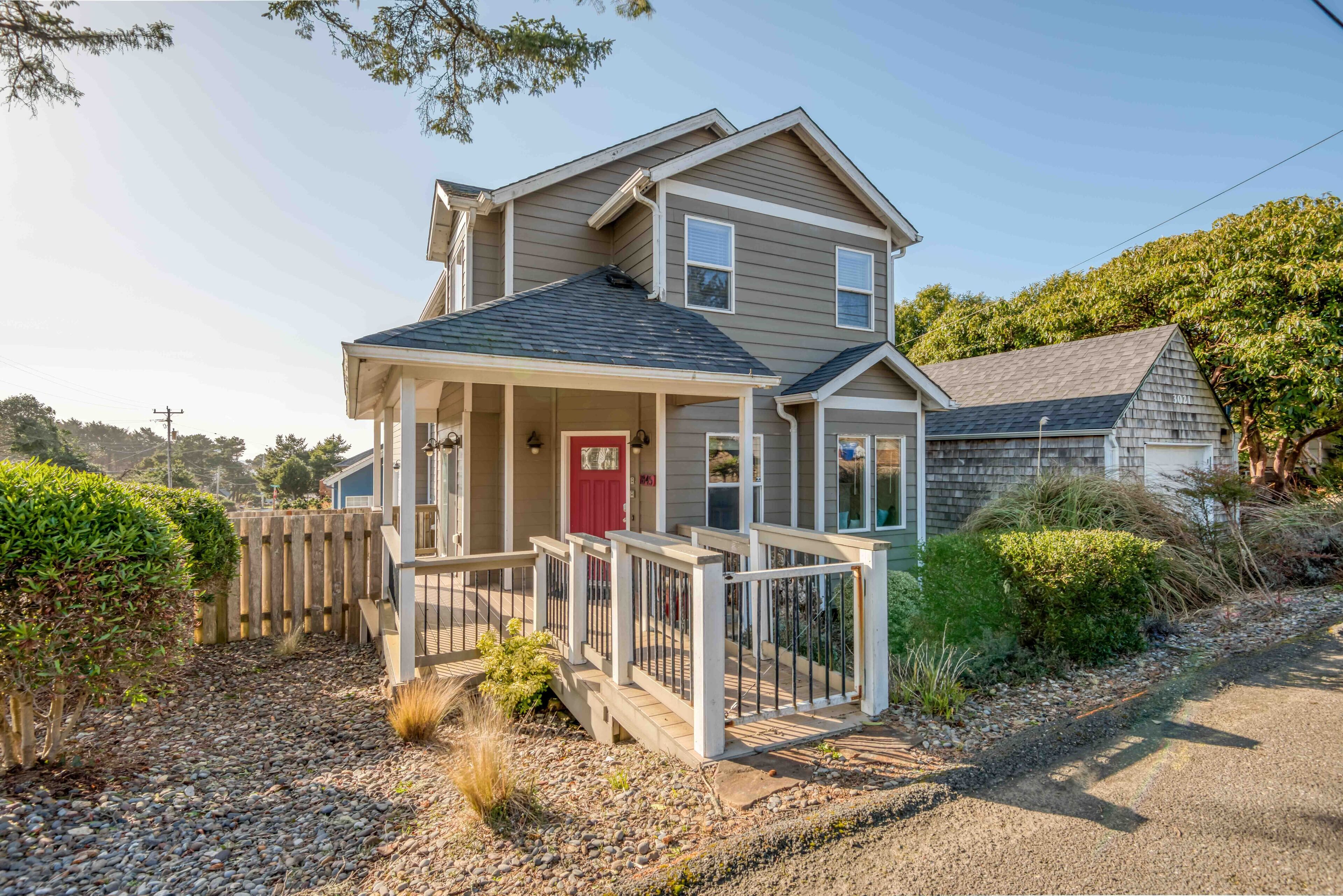 Large remodelled pet friendly home with private fenced yard, close to the beach.