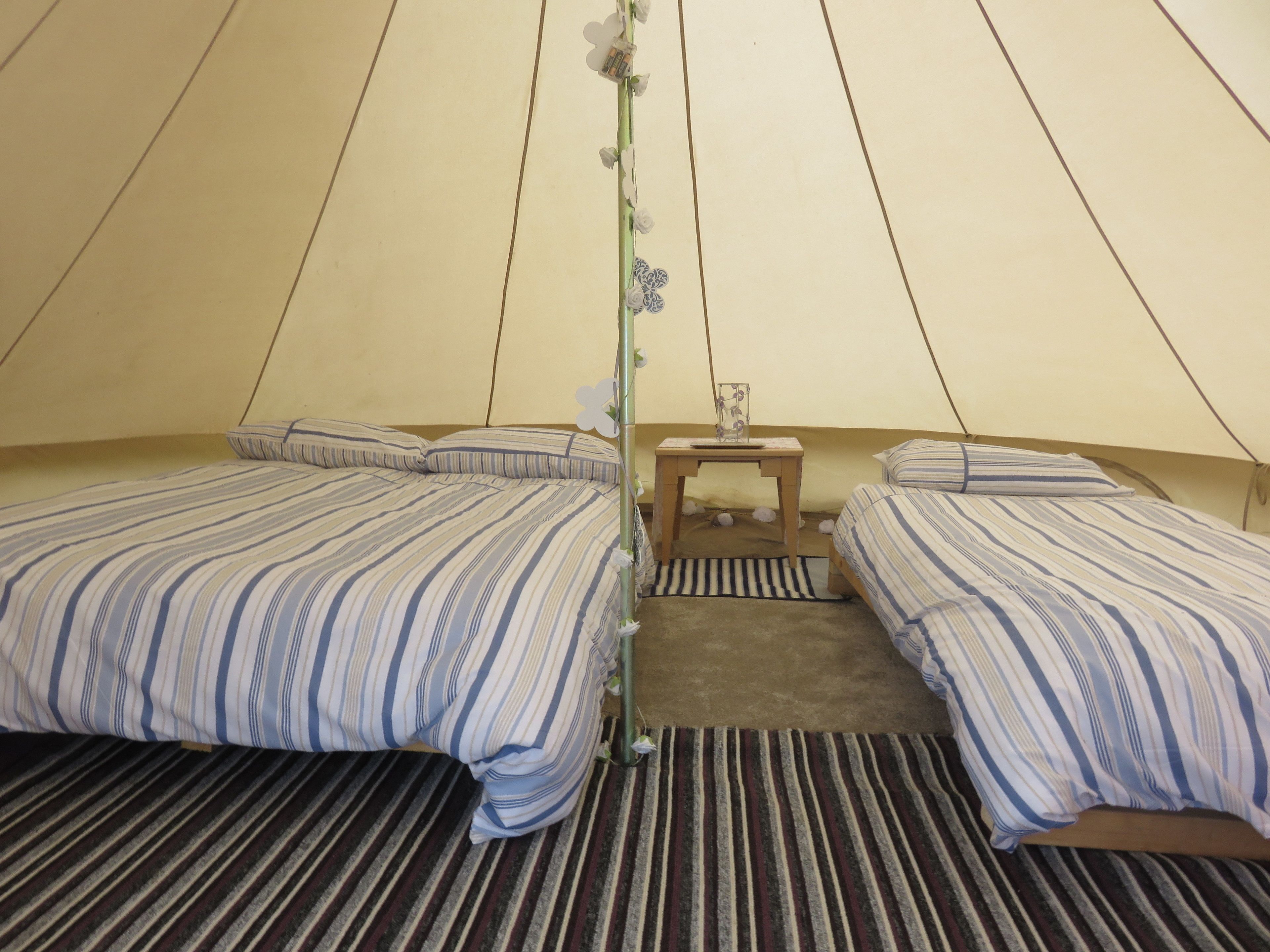 Bell Tent | Individually decorated, individually furnished, bed sheets