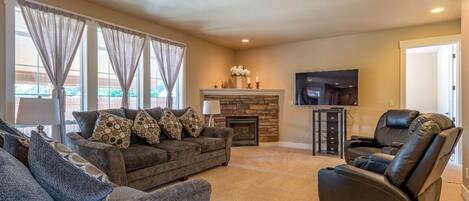 Smart TV, fireplace, music library, video library