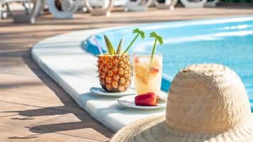 Outdoor pool, open 10:00 AM to 6:00 PM, sun loungers