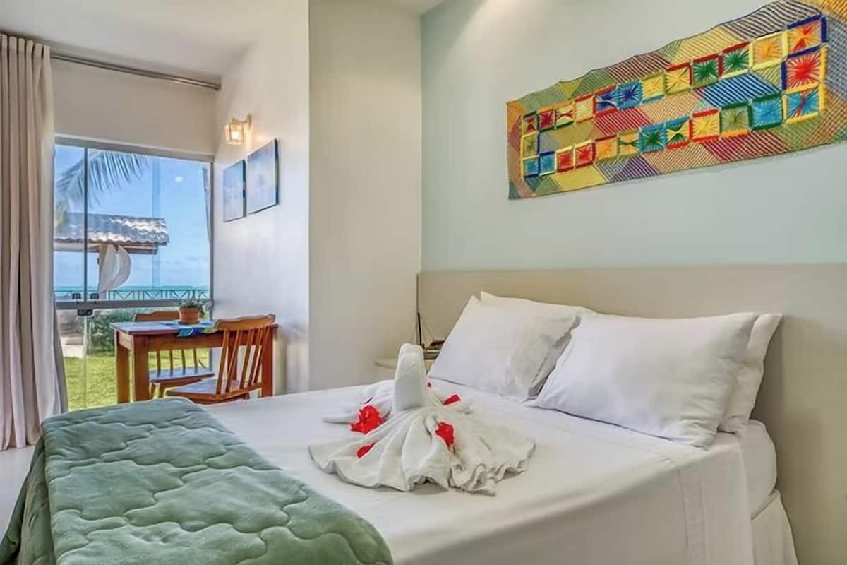 Deluxe Double Room, 1 Double Bed, Ocean View | Minibar, desk, blackout drapes, iron/ironing board