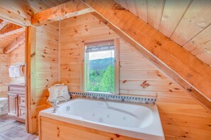 Combined shower/tub, hair dryer, towels, soap