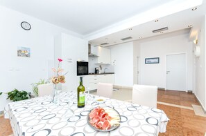 Villa | Private kitchen | Fridge, microwave, oven, stovetop