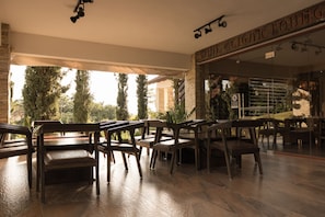 Breakfast, lunch served; local and international cuisine, garden views