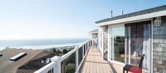 Perched high above Rockaway Beach this home has amazing views of the coast!