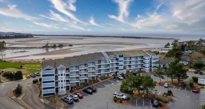Stunning views, easy beach access from this bay front condo in the Taft District