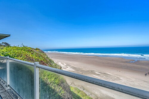 Luxury beachfront home, ocean views from inside or deck, and beach access nearby