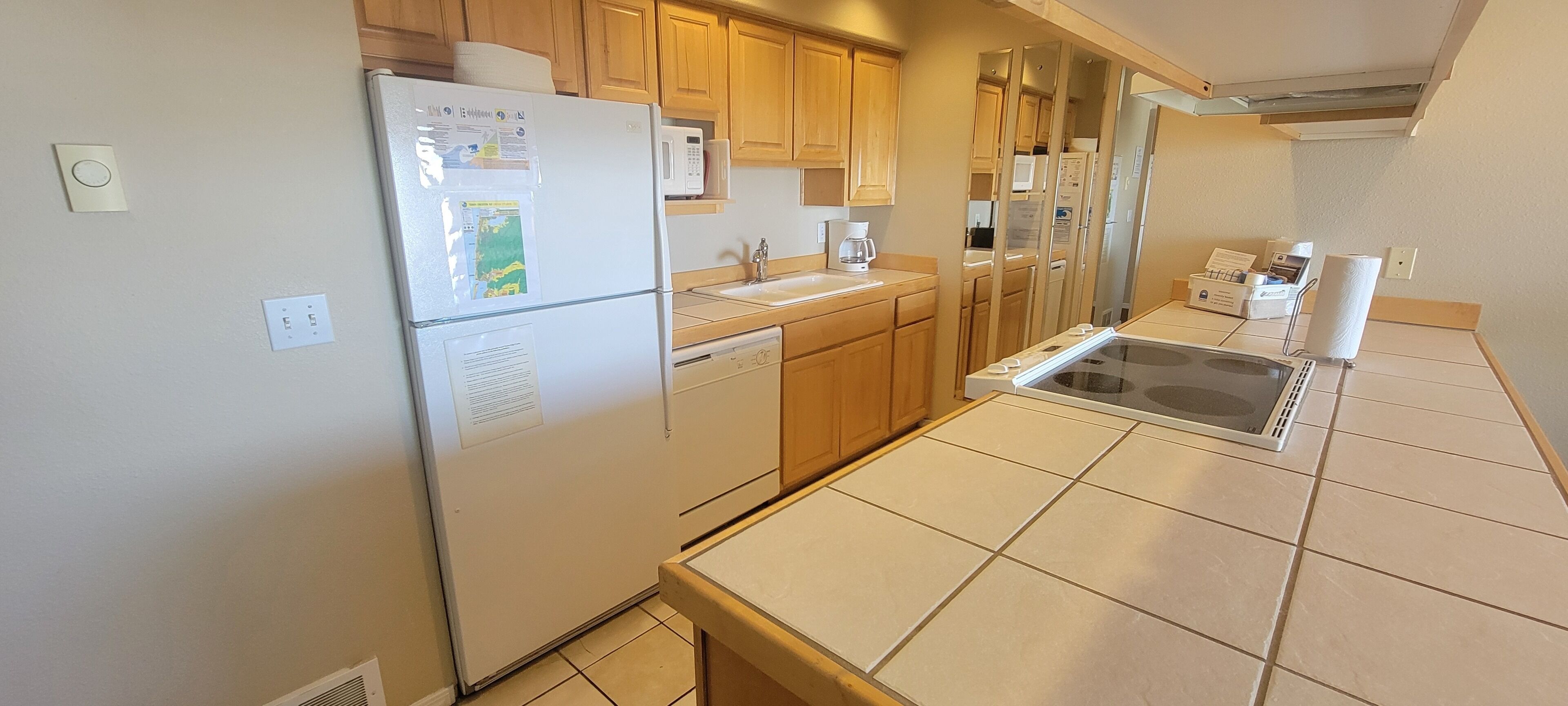 Coffee/tea maker, fridge, microwave, oven