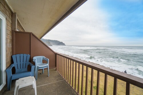 Truly on the beach at this very oceanfront condo, sweeping views on the balcony!