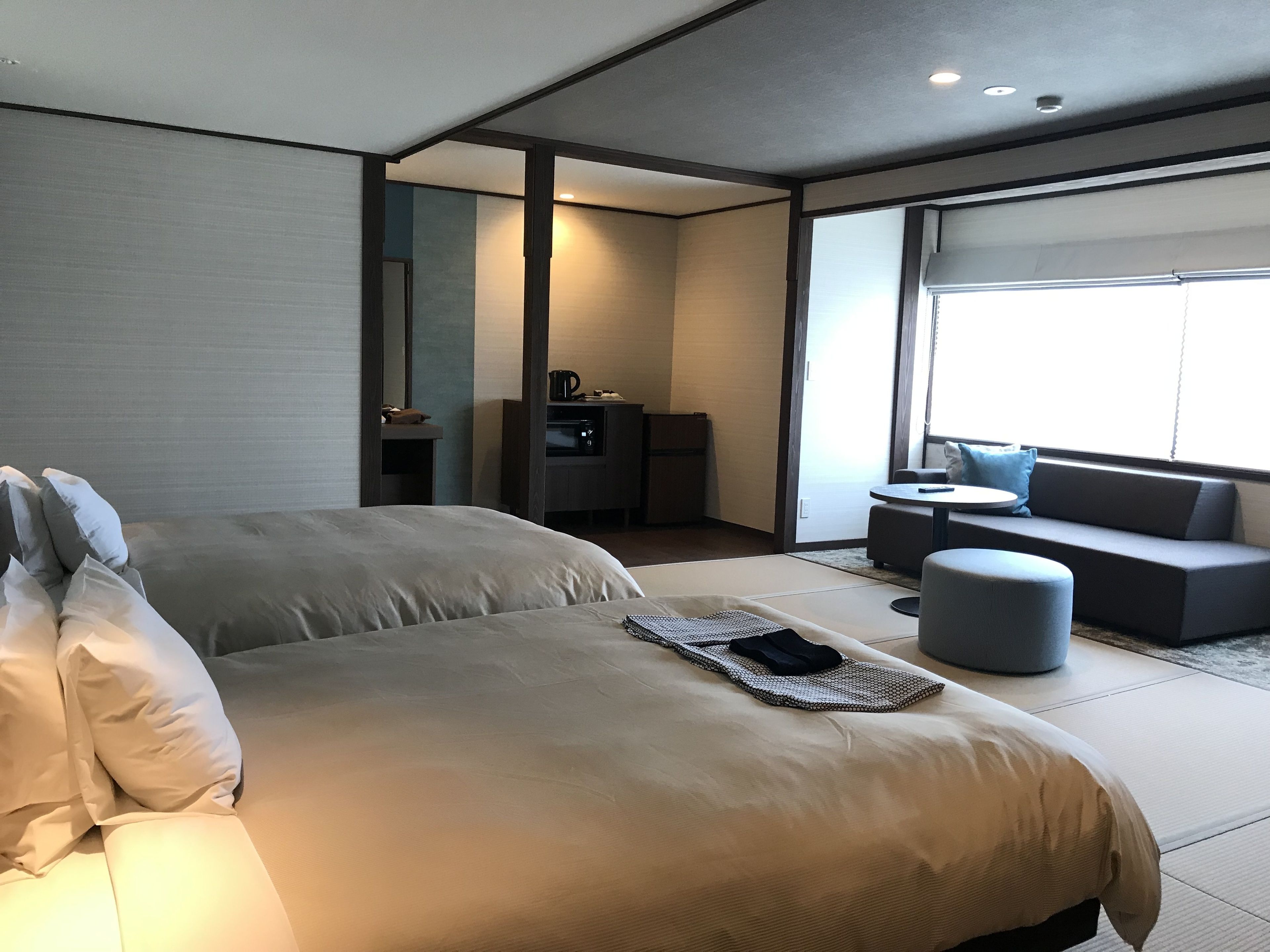 modern japanese-style twin room, with shared hot spring access | down duvets, individually decorated, individually furnished, free wifi