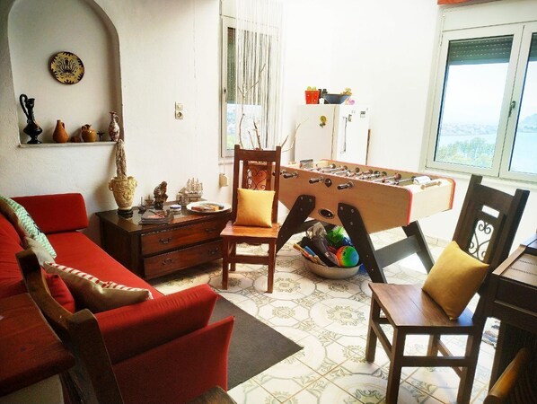 TV, DVD player, table football, books